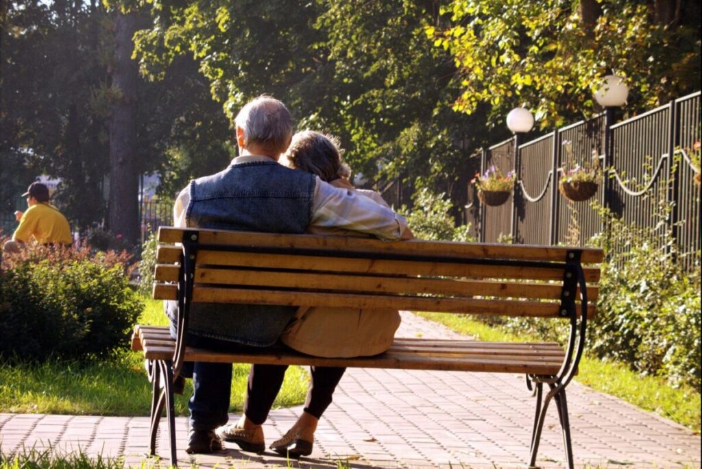 A couple on a bench