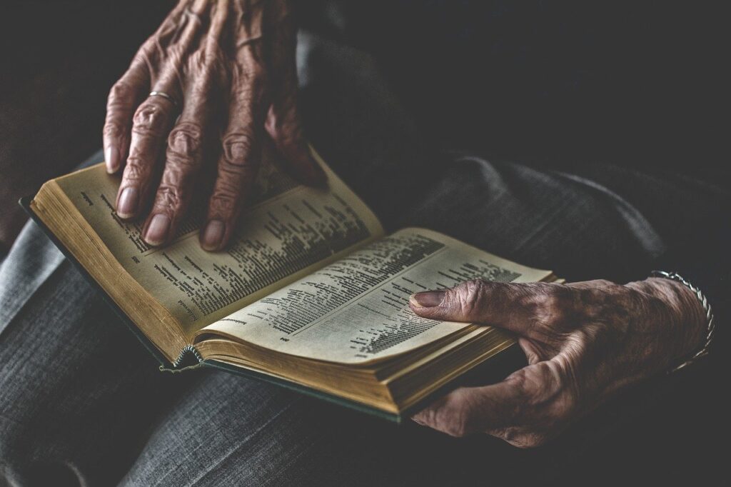 person holding book