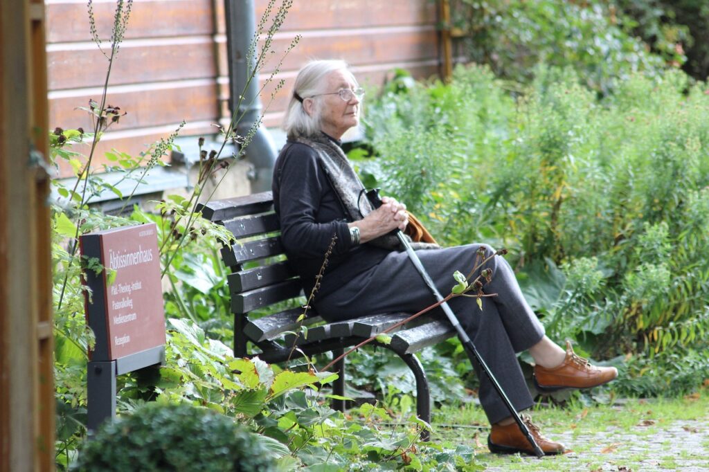 Senior Citizen sitting on bench