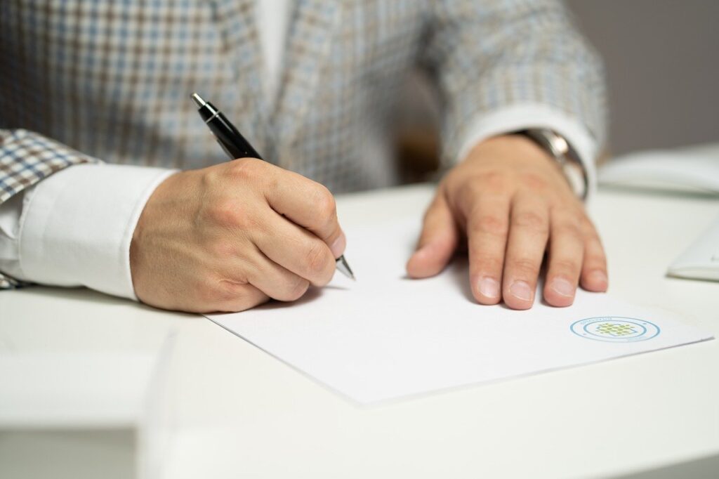 Man signing petition