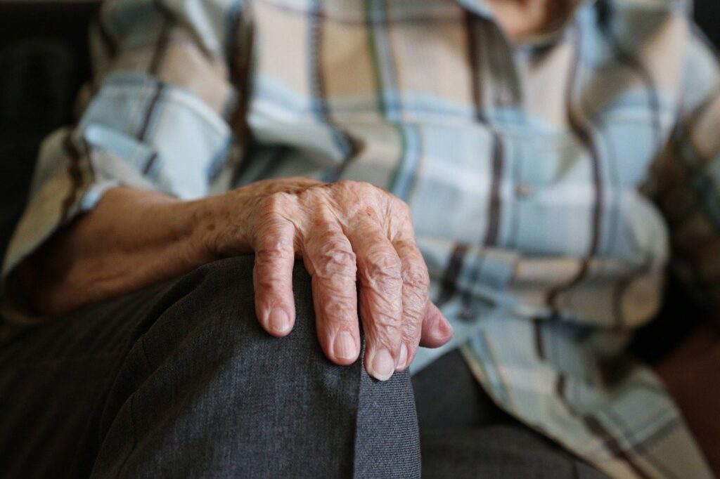 largest COLA increase not enough for seniors; senior citizen hand