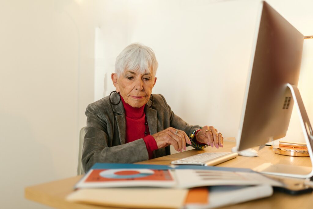 elderly woman working