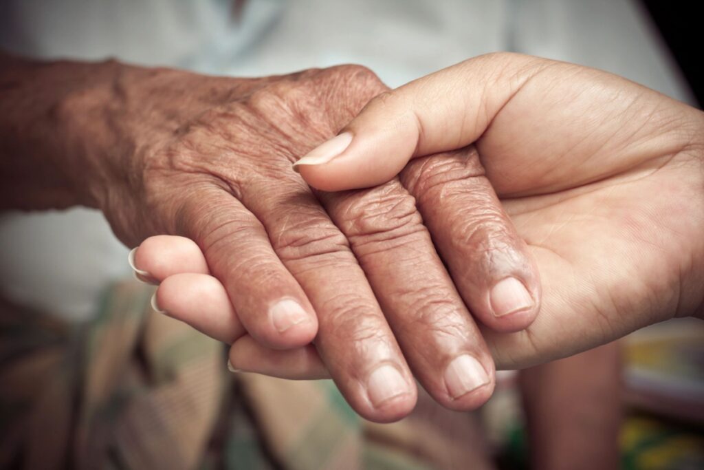 hands holding; legislation to help senior citizens